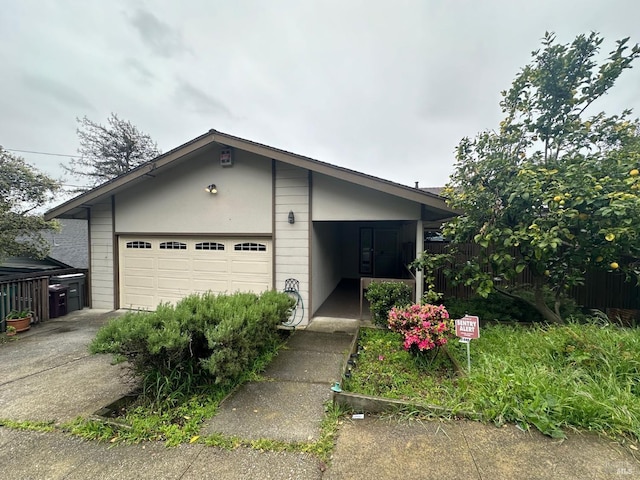 ranch-style house featuring a garage