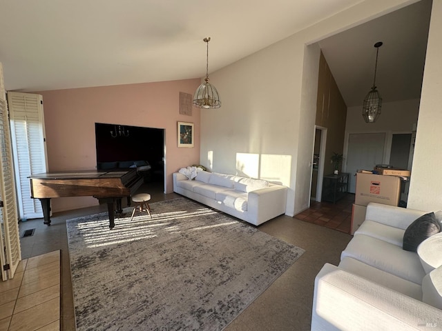 living room featuring lofted ceiling