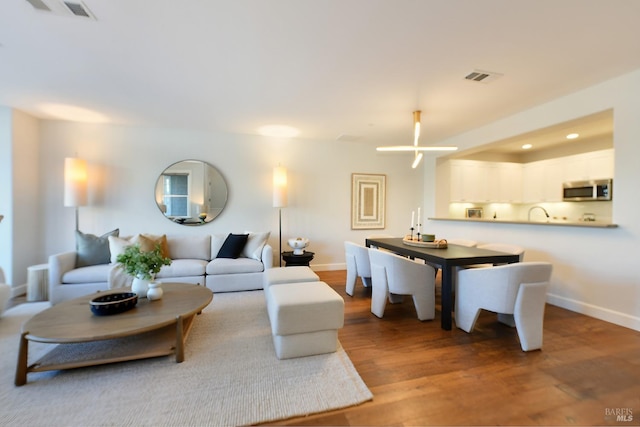 living room with wood-type flooring