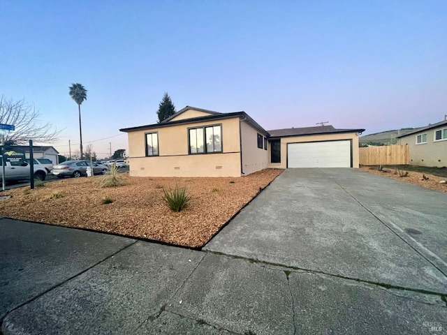 ranch-style house with a garage