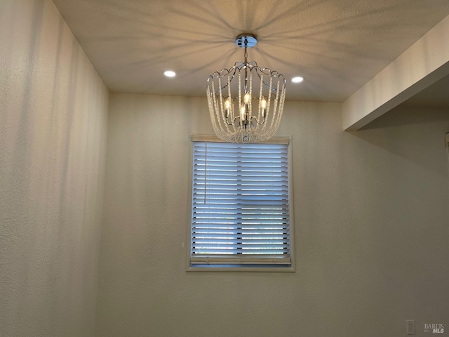 interior space featuring a chandelier