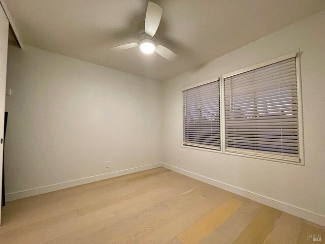 full bathroom featuring vanity, tile patterned floors, shower / bath combination with glass door, and toilet