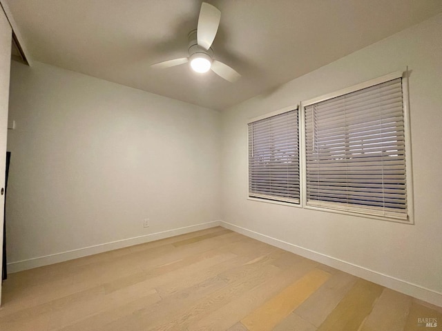 unfurnished room with light hardwood / wood-style floors and ceiling fan