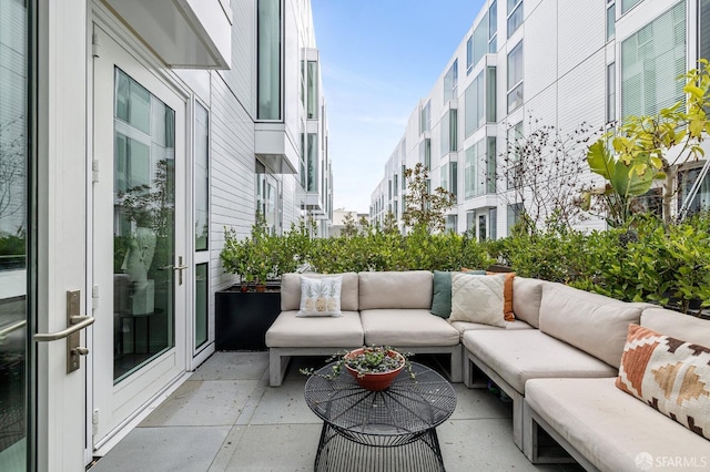 balcony featuring a patio area and outdoor lounge area