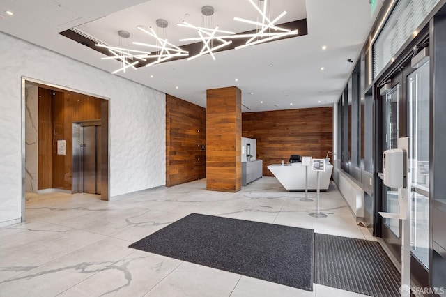 555 Fulton St Unit 214, San Francisco, CA 94102 - building lobby with wooden walls and recessed lighting