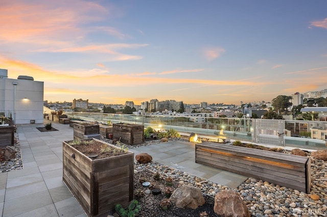 555 Fulton St Unit 214, San Francisco, CA 94102 - view of patio / terrace with a city view and a garden