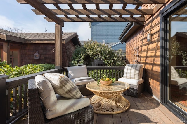 balcony featuring a pergola