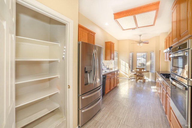 kitchen with ceiling fan and stainless steel appliances