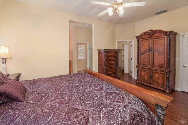 bedroom featuring ceiling fan and dark hardwood / wood-style floors