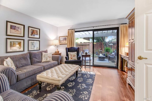 living room with light hardwood / wood-style flooring