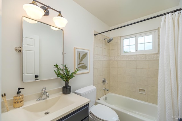 bathroom with toilet, shower / tub combo, and vanity