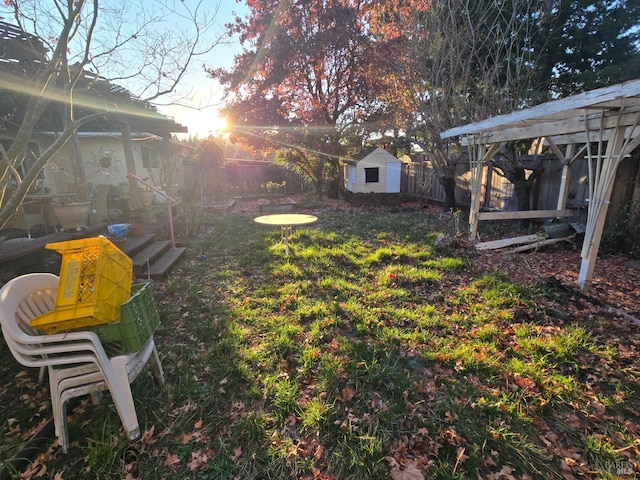 view of yard with a storage unit