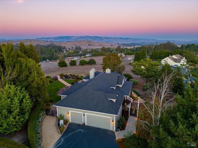 view of aerial view at dusk