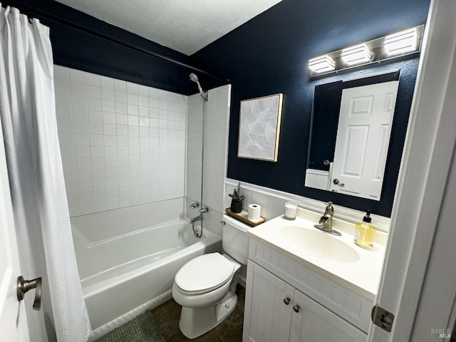 bathroom featuring a textured ceiling, tile patterned flooring, toilet, vanity, and shower / bath combination with curtain