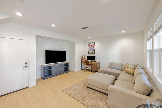 living room with light hardwood / wood-style floors