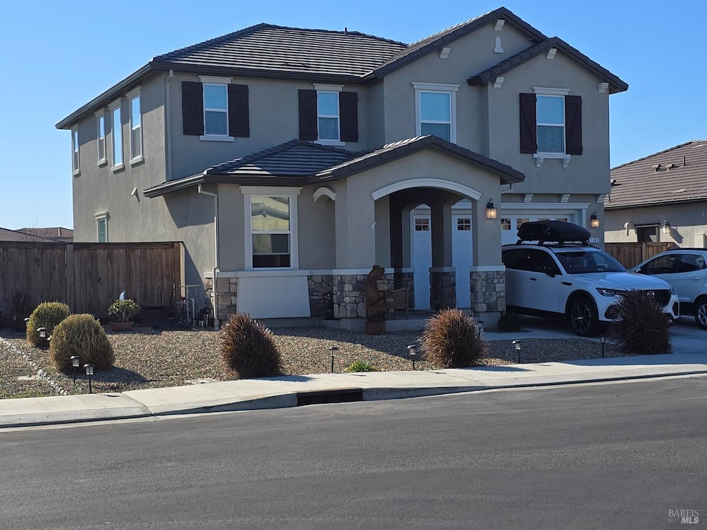 view of property with a garage