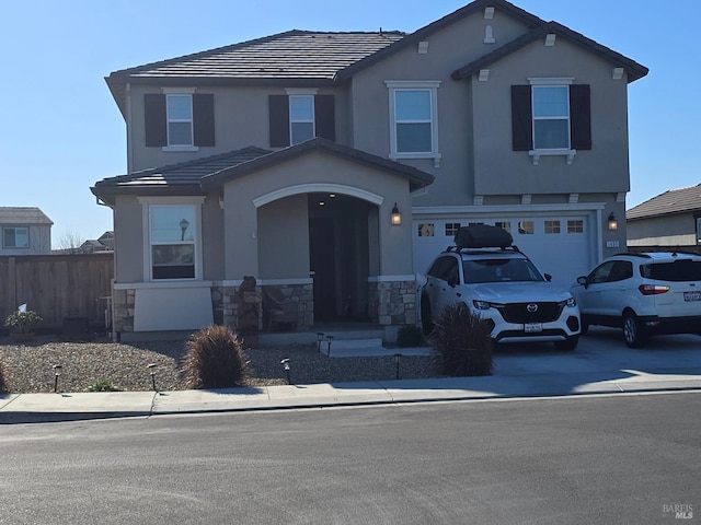 view of property featuring a garage