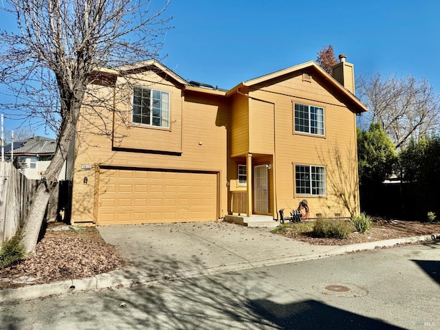 front of property featuring a garage