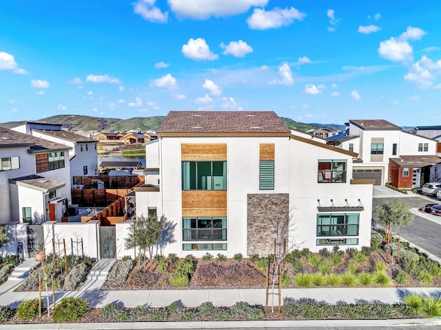 view of front of property with a mountain view