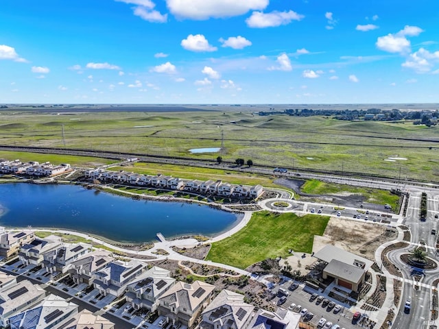 aerial view with a water view and a rural view