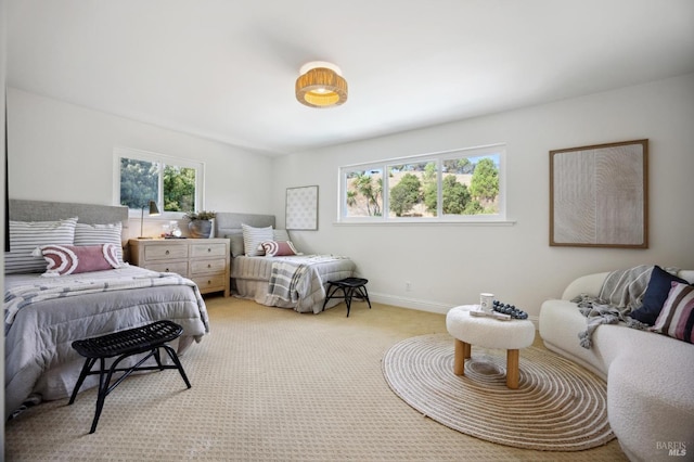 bedroom with light carpet