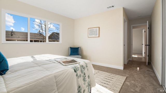 bedroom featuring carpet floors