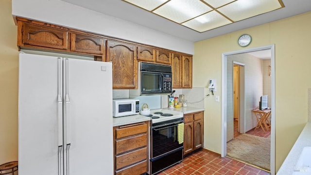 kitchen with tasteful backsplash and white appliances