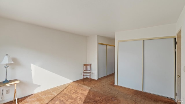 unfurnished bedroom featuring carpet floors