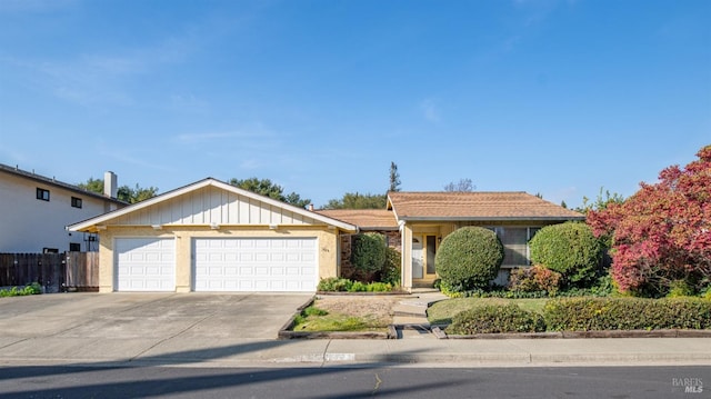 single story home with a garage