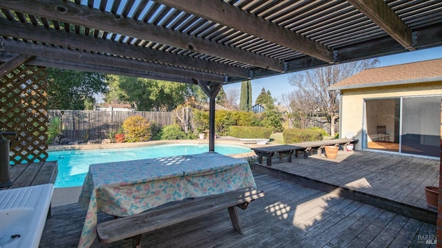 wooden terrace featuring a fenced in pool and a pergola