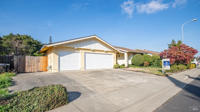 ranch-style home featuring a garage