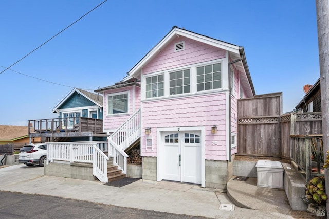 view of front of home with a garage