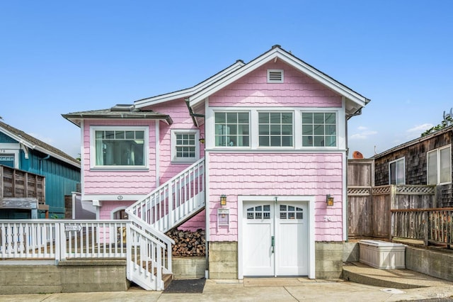 view of front of property with a garage