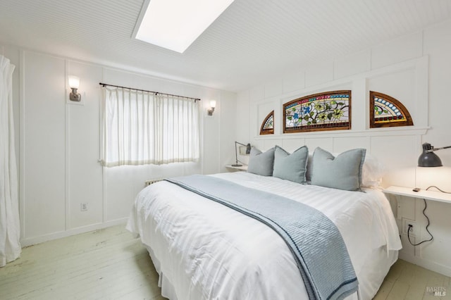 bedroom with a skylight