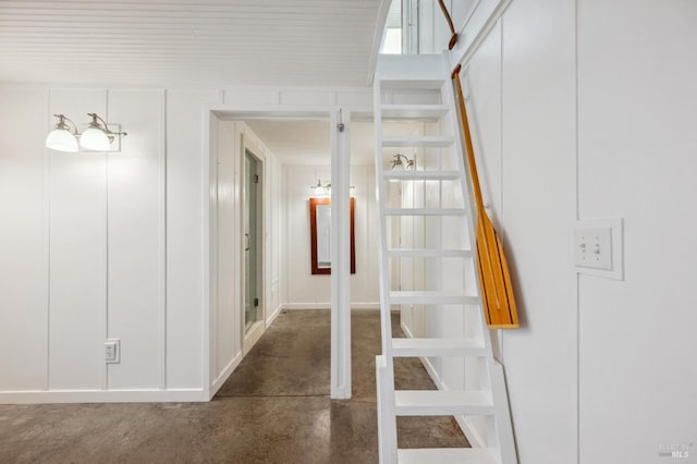 stairs with concrete floors