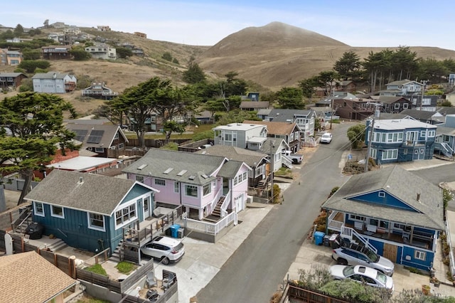 birds eye view of property featuring a mountain view