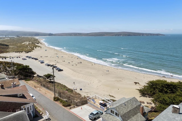 property view of water featuring a beach view