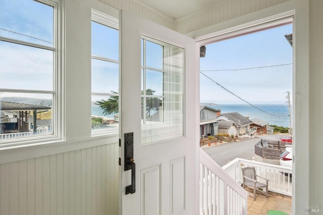 entryway featuring a water view