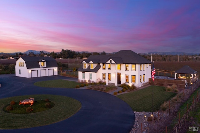 view of front of home with a yard