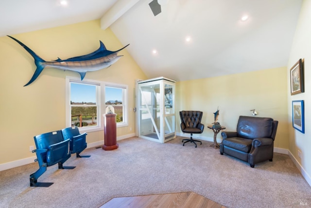 living area with lofted ceiling with beams and light colored carpet