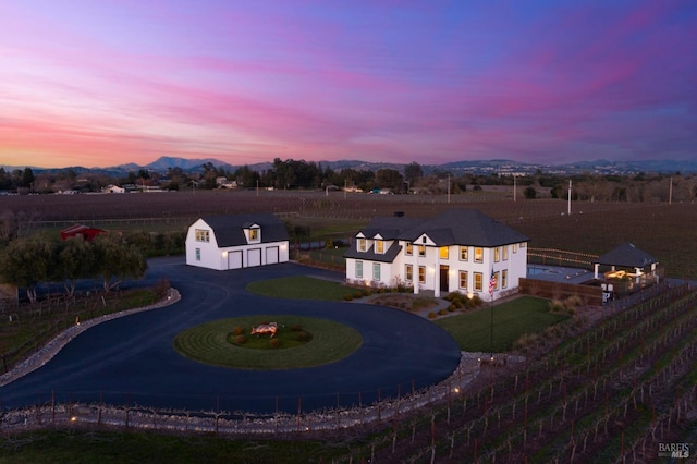 aerial view at dusk with a mountain view