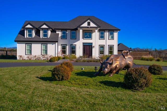 view of front of home featuring a front lawn