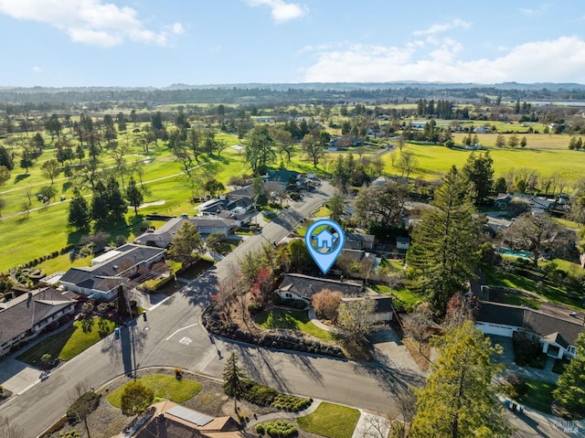 birds eye view of property with a residential view