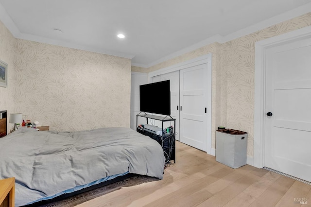 bedroom with light hardwood / wood-style flooring