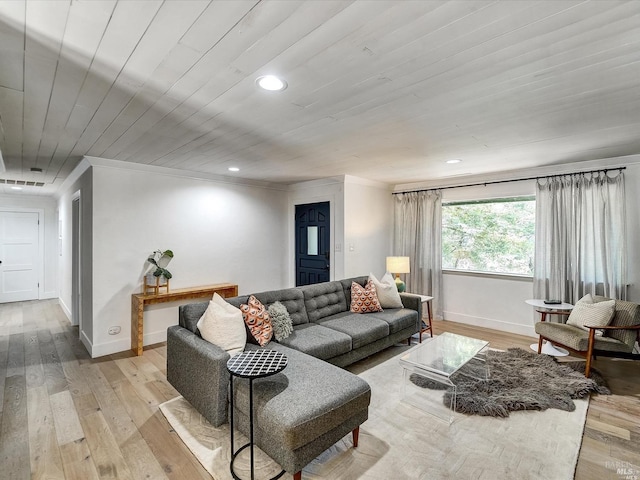 living room with wooden ceiling, ornamental molding, and light wood-type flooring