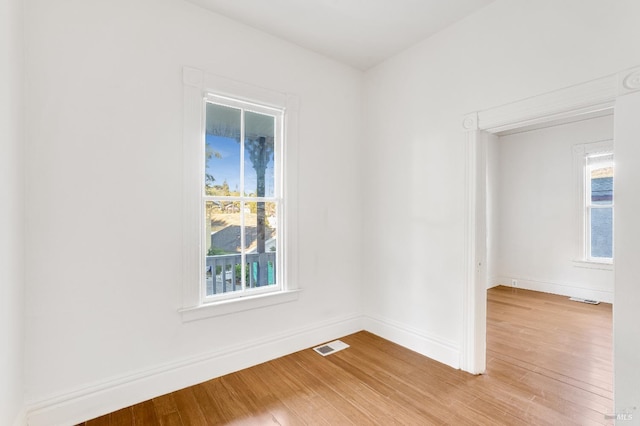 empty room featuring hardwood / wood-style floors