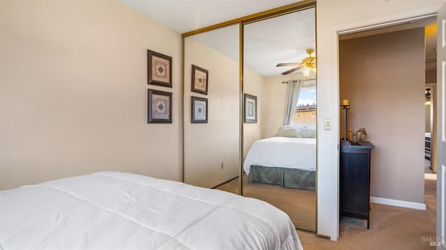 carpeted bedroom featuring a closet