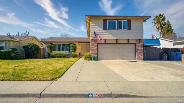 traditional-style home with a front yard, fence, brick siding, an attached garage, and concrete driveway