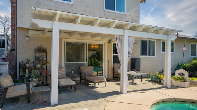 back of house featuring a patio