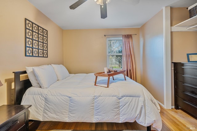 bedroom featuring ceiling fan and light wood-type flooring